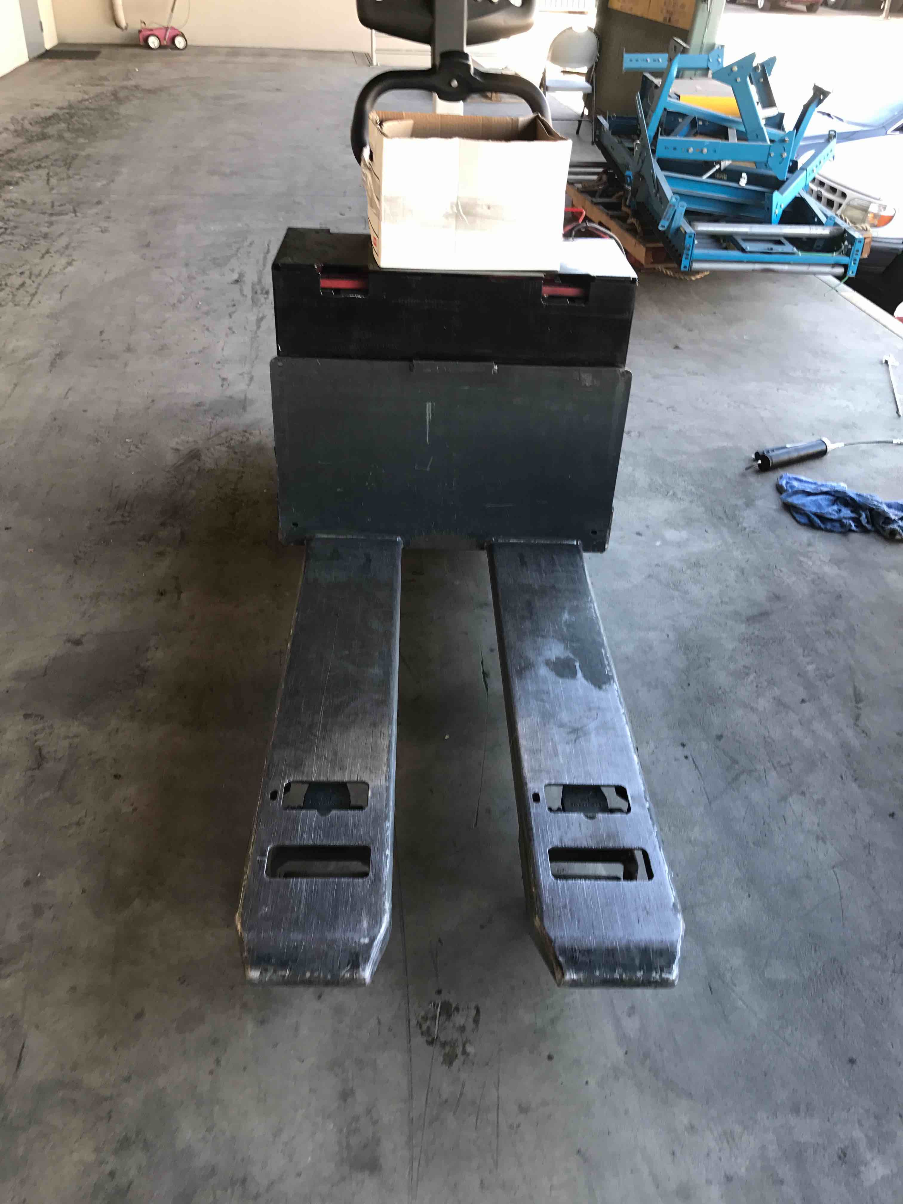 NISSAN RPX60B 27X48 Rider Jack forklift, 6000 capacity, 9.5 lift height. Serial 2W26-9321408, Year 2015.